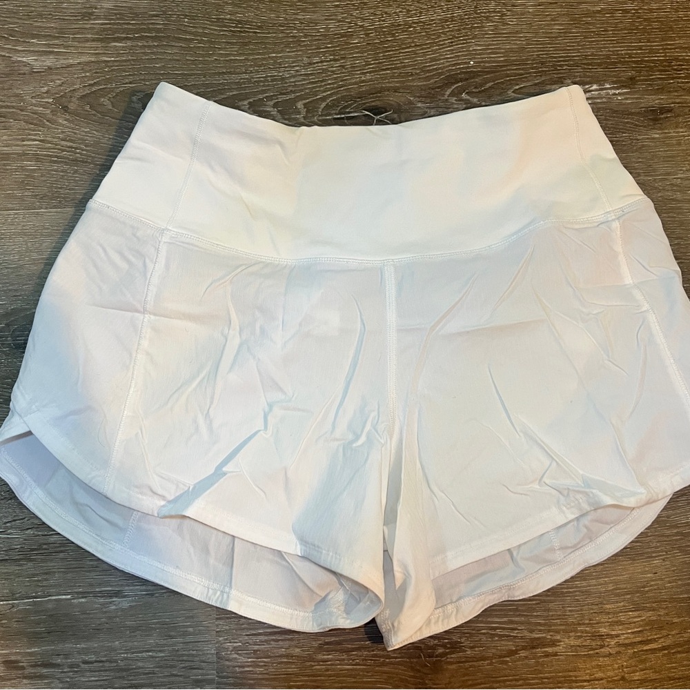 white lululemon shorts
